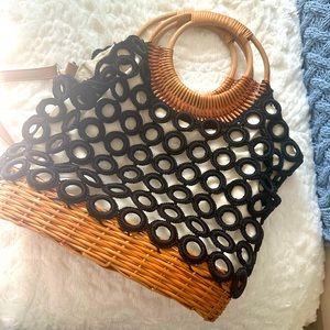 Black and white bag with wicker bottom and handles.  Used once